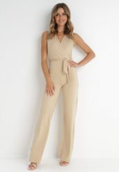 Beżowy Kombinezon Chionadina. Brązowe sukienki Born2be, l, bez wzorów, eleganckie, bez kołnierzyka, bez ramiączek, maxi, kopertowe. Za 129.99 zł.