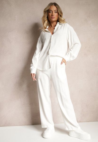 Biały Wiskozowo-Lniany Komplet z Koszulą i Luźnymi Spodniami Hanorwen. Białe koszule Renee, l, bez wzorów, ze lnu, eleganckie, bez kołnierzyka, bez ramiączek. Za 179.99 zł.