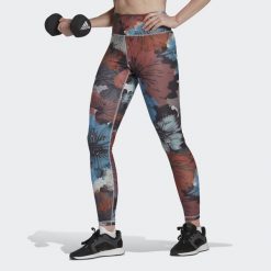 Damskie legginsy z wysokim stanem z nadrukiem adidas Training Essentials. Czerwone legginsy Adidas, xl, bez wzorów, z podwyższonym stanem. W wyprzedaży za 147.25 zł.