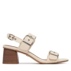 Sandały Tamaris. Białe sandały Tamaris, bez wzorów, bez obcasa, na słupku, bez zapięcia. Za 369.99 zł.