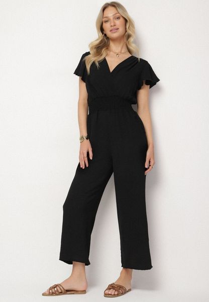 Czarny Kombinezon z Kopertowym Dekoltem i Szeroką Gumką w Pasie Evimevi. Czarne sukienki Born2be, na co dzień, l, bez wzorów, bez kołnierzyka, bez ramiączek, mini, kopertowe. Za 69.99 zł.