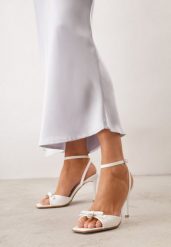 Białe Eleganckie Sandały VICES na Szpilce z Kokardą i Aplikacją z Cyrkoniami Melirea. Białe sandały Born2be, z aplikacjami, biznesowe, bez obcasa, na obcasie, bez zapięcia. Za 89.99 zł.