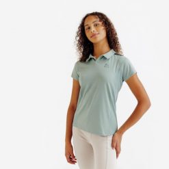 Koszulka polo z krótkim rękawem Club - zielona. Zielone bluzki FOUGANZA, bez wzorów, z elastanu, bez kołnierzyka, bez ramiączek. Za 59.99 zł.