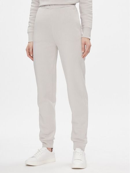 Calvin Klein Spodnie dresowe Metallic Micro Logo Jogger K20K206965 Beżowy Regular Fit. Brązowe spodnie dresowe Calvin Klein, xl, bez wzorów, z dresówki. Za 279.99 zł.