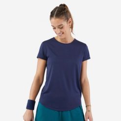 Koszulka do tenisa z okrągłym dekoltem damska Artengo Dry Essential 100. Niebieskie bluzki KUIKMA, xs, bez wzorów, z materiału, eleganckie, bez kołnierzyka, bez ramiączek. Za 39.99 zł.
