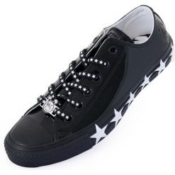 Buty Kobieta Converse Miley Cyrus Chuck Taylor All Star czarny. Białe trampki Converse, bez wzorów, ze skóry ekologicznej, bez zapięcia. Za 296.99 zł.