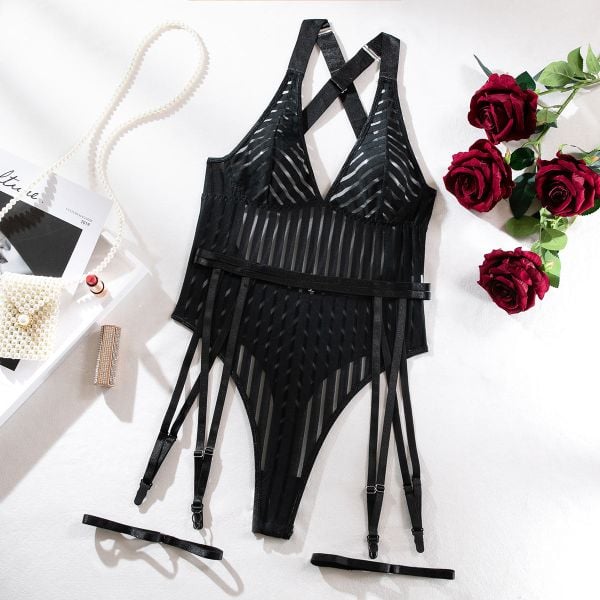 Body z pasem do pończoch na romantyczne wieczory Annelotte. Czarne body Intica, l, bez wzorów, z materiału. Za 119.00 zł.