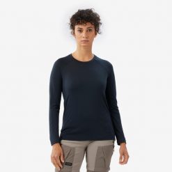 Koszulka trekkingowa damska z długim rękawem Merino Resist. Czarne bluzki FORCLAZ, l, bez wzorów, z materiału, sportowe, bez kołnierzyka, bez ramiączek. Za 199.99 zł.