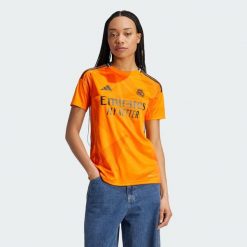 Koszulka Real Madrid 24/25 Away. Brązowe bluzki Adidas, xs, bez wzorów, z materiału, sportowe, bez kołnierzyka, bez ramiączek. Za 449.00 zł.