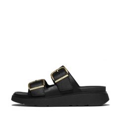 Damskie sandały na koturnie FitFlop Gen-FF. Białe sandały FIT FLOP, bez wzorów, z materiału, eleganckie, bez obcasa, na koturnie, bez zapięcia. Za 715.50 zł.