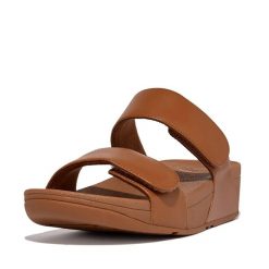 Skórzane sandały dla kobiet FitFlop Lulu Adjustable. Czarne sandały Flip Flop, bez wzorów, ze skóry, bez obcasa, bez zapięcia. Za 478.50 zł.