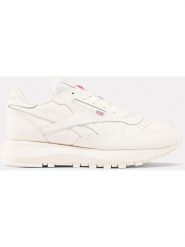 Reebok Skórzane sneakersy "Classic Leather" w kolorze białym rozmiar: 37. Białe trampki Reebok, bez wzorów, z materiału, bez zapięcia. Za 211.31 zł.