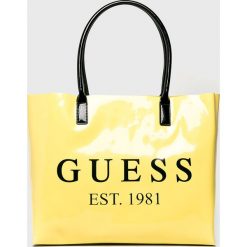 Guess Jeans - Torebka. Żółte shopper Guess Jeans, z aplikacjami, z jeansu, casualowe, do ręki, duże, z nadrukiem, bez dodatków. W wyprzedaży za 199.90 zł.