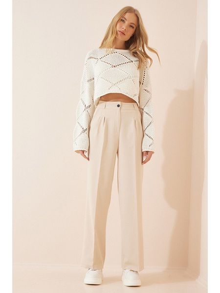 Happiness Istanbul Spodnie w kolorze kremowym rozmiar: 40. Brązowe spodnie materiałowe Happiness Istanbul, na co dzień, bez wzorów, z materiału, z podwyższonym stanem. Za 65.69 zł.