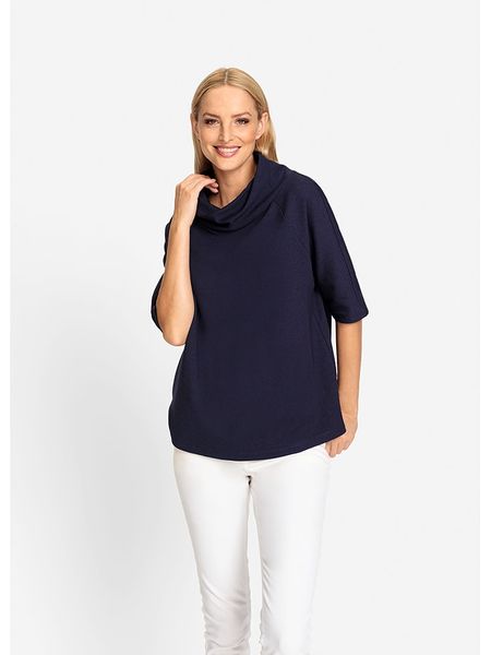 Heine Bluzka w kolorze granatowym rozmiar: 42. Niebieskie bluzki Heine, bez wzorów, bez kołnierzyka, bez ramiączek. Za 95.46 zł.