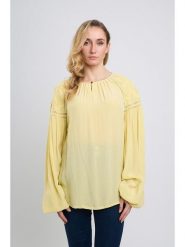 Marks & Spencer Bluzka w kolorze żółtym rozmiar: 38. Żółte bluzki Marks & Spencer, bez wzorów, z wiskozy, bez kołnierzyka, bez ramiączek. Za 98.95 zł.