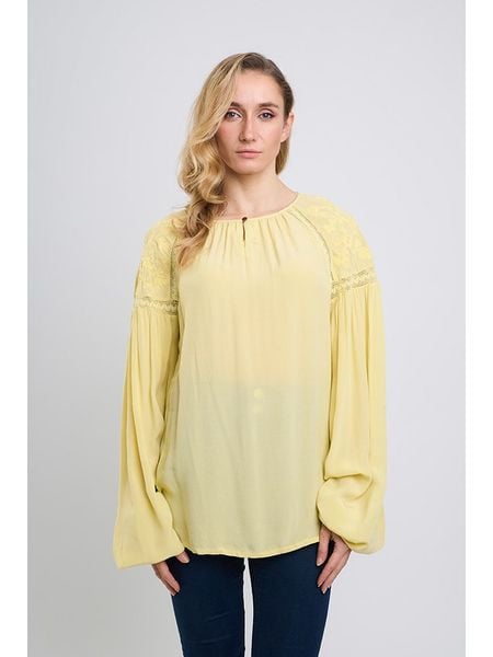 Marks & Spencer Bluzka w kolorze żółtym rozmiar: 38. Żółte bluzki Marks & Spencer, bez wzorów, z wiskozy, bez kołnierzyka, bez ramiączek. Za 98.95 zł.