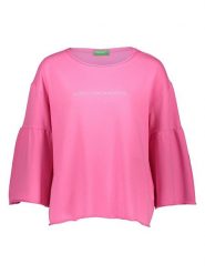 Benetton Bluza w kolorze jasnoróżowym rozmiar: M. Różowe bluzy Benetton, m, bez wzorów, z bawełny, bez kaptura. Za 57.20 zł.