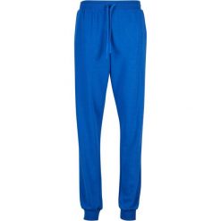 Spodnie dresowe dla kobiet Urban Classics Light Terry. Niebieskie spodnie dresowe Urban Classics, bez wzorów, z dresówki. Za 175.50 zł.