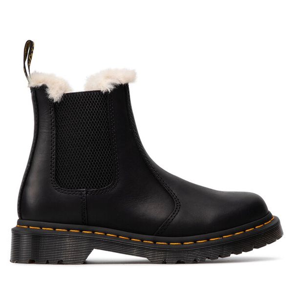 Sztyblety Dr. Martens. Czarne botki Dr. Martens, bez wzorów, bez obcasa, na płaskiej podeszwie, bez zapięcia. Za 939.99 zł.