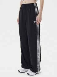 Adidas Spodnie dresowe adicolor Firebird JV7525 Czarny Regular Fit. Czarne spodnie dresowe Adidas, xl, bez wzorów, z dresówki. Za 349.99 zł.