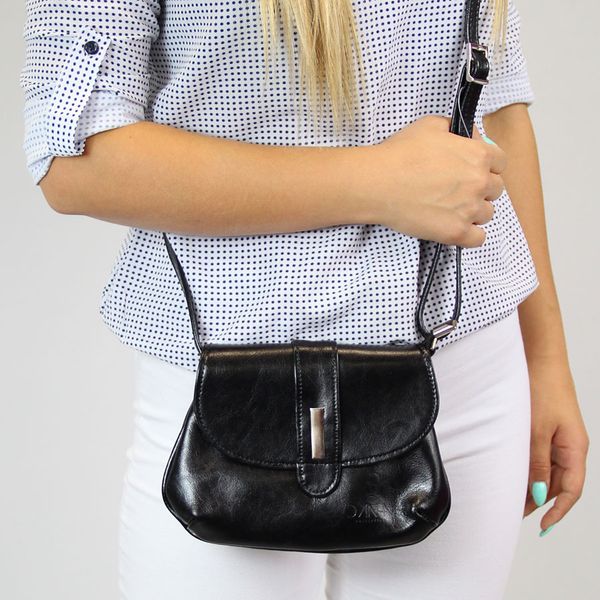 Torebka skórzana damska listonoszka DAN-A T79 czarna. Czarne torebki klasyczne DAN-A, bez wzorów, ze skóry, małe, bez dodatków. Za 149.99 zł.