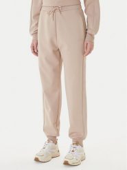 Guess Spodnie dresowe V5BB23 KCX22 Beżowy Regular Fit. Brązowe spodnie dresowe Guess, xxs, z aplikacjami, z dresówki. Za 479.99 zł.