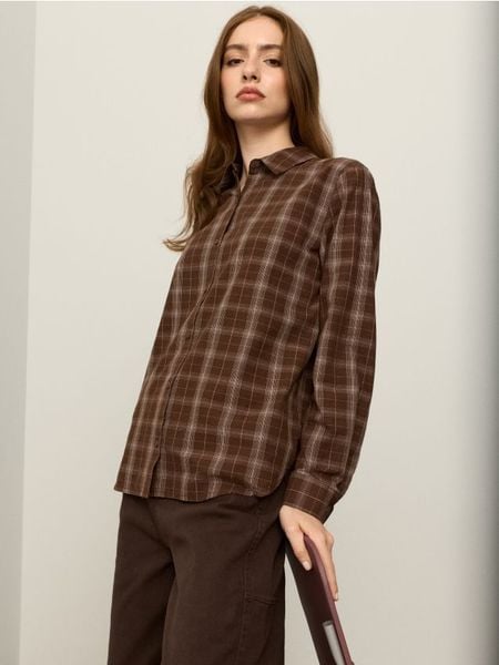 Bawełniana koszula oversize w kratę - wielobarwny. Koszule Sinsay, l, bez wzorów, z bawełny, bez kołnierzyka, bez ramiączek. Za 39.99 zł.