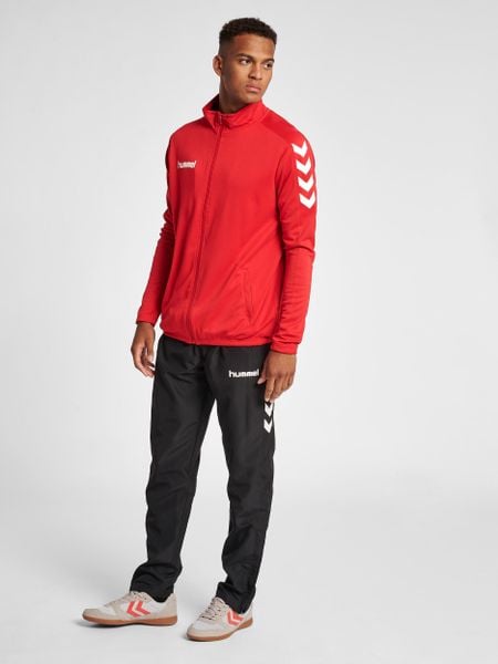 Bluza sportowa dla dorosłych Hummel Core Poly Jacket. Czerwone bluzy Hummel, xl, bez wzorów, z materiału, bez kaptura. Za 60.00 zł.