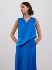 BGN Top w kolorze niebieskim rozmiar: 34. Niebieskie topy BGN, bez wzorów, bez kołnierzyka, bez ramiączek. Za 56.99 zł.