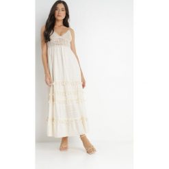 Jasnobeżowa Sukienka Dorassa. Brązowe sukienki Born2be, m, bez wzorów, z bawełny, boho, bez kołnierzyka, bez ramiączek, maxi, rozkloszowane. Za 199.99 zł.