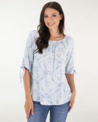 Bluzka w delikatne kwiaty. Niebieskie bluzki Unisono, l, bez wzorów, z tkaniny, bez kołnierzyka, bez ramiączek. Za 129.00 zł.