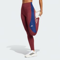 Legginsy Own The Run Colorblock Full-Length. Czerwone legginsy Adidas, xs, bez wzorów, z materiału. Za 329.00 zł.