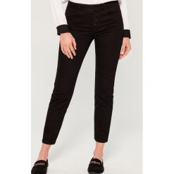 Jeansy skinny fit z wysokim stanem - Czarny. Jeansy Mohito. Za 99.99 zł.