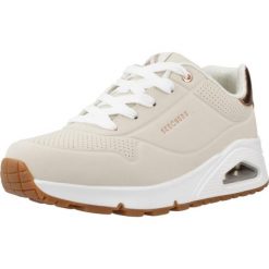Kapcie SKECHERS UNO GEN1 Beżowy. Brązowe obuwie domowe Skechers, bez wzorów, z syntetyku, bez zapięcia. Za 308.99 zł.