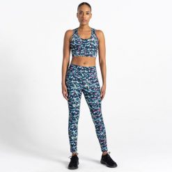 Damskie legginsy sportowe Influential. Niebieskie legginsy sportowe Dare 2b, bez wzorów, na fitness i siłownię. W wyprzedaży za 85.49 zł.