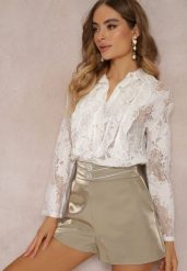 Biała Koszula z Falbankami z Koronkowej Tkaniny Danya. Białe koszule Renee, bez wzorów, z jeansu, eleganckie, bez kołnierzyka, bez ramiączek. Za 99.99 zł.