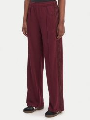 Adidas Spodnie dresowe Firebird Lace KC6445 Bordowy Loose Fit. Czerwone spodnie sportowe Adidas, l, bez wzorów, z dresówki. Za 329.99 zł.