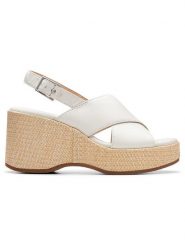 Clarks Skórzane sandały "Manon Wish" w kolorze białym na koturnie rozmiar: 40. Białe sandały Clarks, bez wzorów, z otwartym noskiem, bez obcasa, na koturnie, bez zapięcia. Za 243.27 zł.