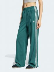 Adidas Spodnie dresowe w kolorze morskim rozmiar: XS. Zielone spodnie dresowe Adidas, xs, bez wzorów, z dresówki. Za 234.95 zł.