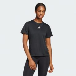 Koszulka Les Mills Graphic. Czarne bluzki Adidas, m, bez wzorów, sportowe, bez kołnierzyka, bez ramiączek. Za 199.00 zł.