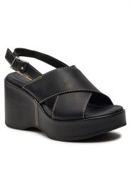 Clarks Sandały Manon Wish 26176299 Czarny. Czarne sandały Clarks, bez wzorów, ze skóry, bez obcasa, na koturnie, bez zapięcia. Za 539.99 zł.