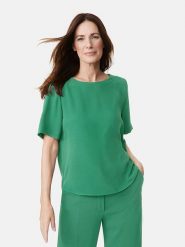 Gerry Weber Bluzka w kolorze zielonym rozmiar: 38. Zielone bluzki Gerry Weber, bez wzorów, bez kołnierzyka, bez ramiączek. Za 114.98 zł.