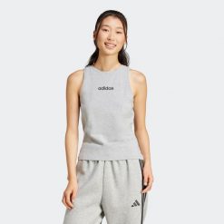 Koszulka bez rękawów damska ADIDAS Gym & Pilates. Koszulki sportowe Adidas, bez wzorów, z bawełny, bez ramiączek, na fitness i siłownię. Za 89.99 zł.
