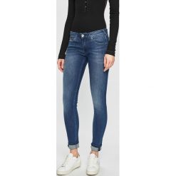 Tommy Jeans - Jeansy Sophie. Niebieskie bluzki Tommy Jeans, bez wzorów, z obniżonym stanem. W wyprzedaży za 379.90 zł.