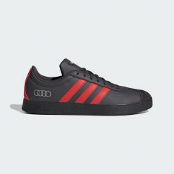 Buty Vl Court Audi Revolut F1 Team. Białe obuwie sportowe Adidas, z syntetyku, bez zapięcia. Za 299.00 zł.