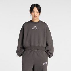 Bluza damska New Balance WT61935IABR – szara. Szare bluzy New Balance, s, z aplikacjami, z bawełny, bez kaptura. Za 259.99 zł.