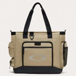 Torba unisex Oakley ROVER beżowa FOS902082-32F. Brązowe torby na ramię Oakley, bez wzorów, z tkaniny, biznesowe, na ramię, bez dodatków. Za 355.91 zł.