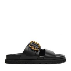 Klapki GINO ROSSI. Czarne klapki Gino Rossi, bez wzorów, bez obcasa. Za 329.99 zł.