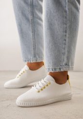 Żółte Minimalistyczne Tenisówki z Imitacji Skóry z Drobną Perforacją Lalosa. Żółte trampki Born2be, bez wzorów, z dzianiny, bez zapięcia. Za 59.99 zł.